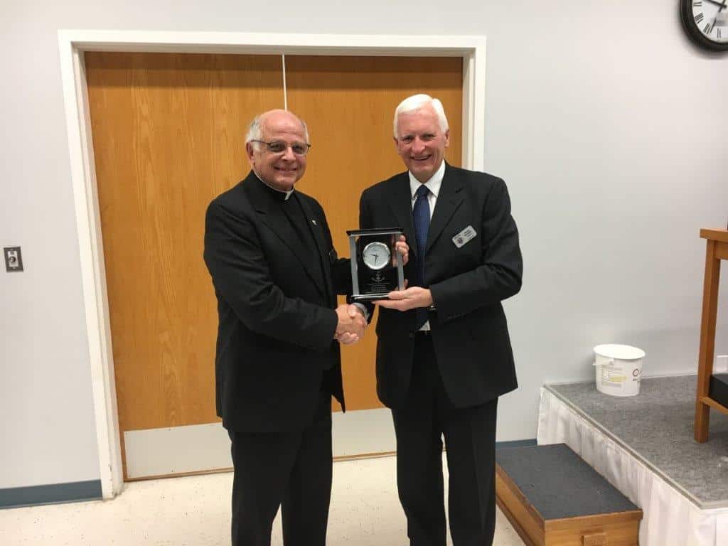 Indigenous & Non-Indigenous Relations Endowment Fund 1 President Harvey Granatier presents appreciation gift to Father Tonny Dizy.