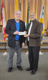 GK Eugene presents cheque to Fr. Oliver - Holy Child Parish - Families in Need