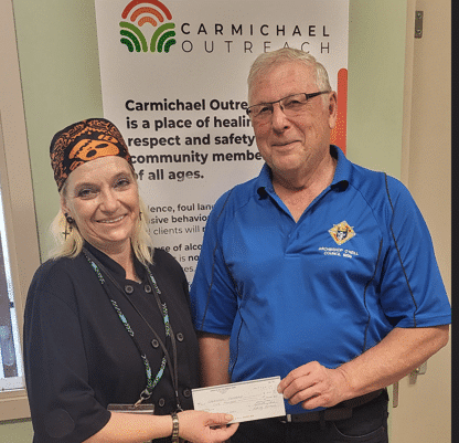 Noma Yurkiw receives a cheque from GK Eugene
