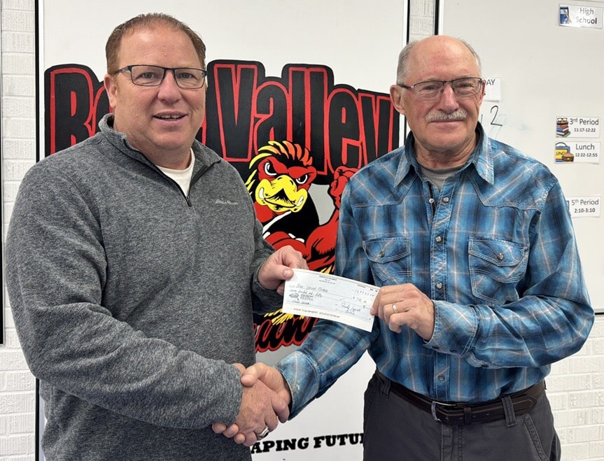 Feeding the Hungry in the Kelvington Area 3 Br Frank Lipinski, FS, presents the cheque to the Principal of Rose Valley School