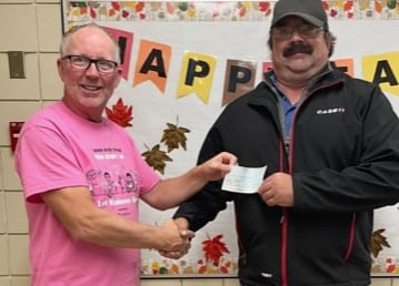 Feeding the Hungry in the Kelvington Area 4 Bro Mitchel Staszczak, Membership Director, presents the cheque to a Wadena Elementary School Teacher