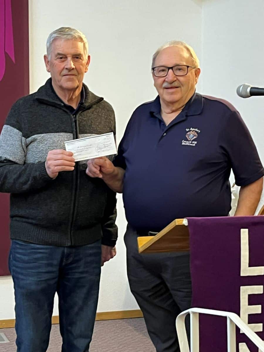 Council 9761 Shellbrook Presents Their Incentive Cheques 10 Presentation to Finance Chair St. Henry's Parish, Maurice Garand by Grand Knight Al Dion