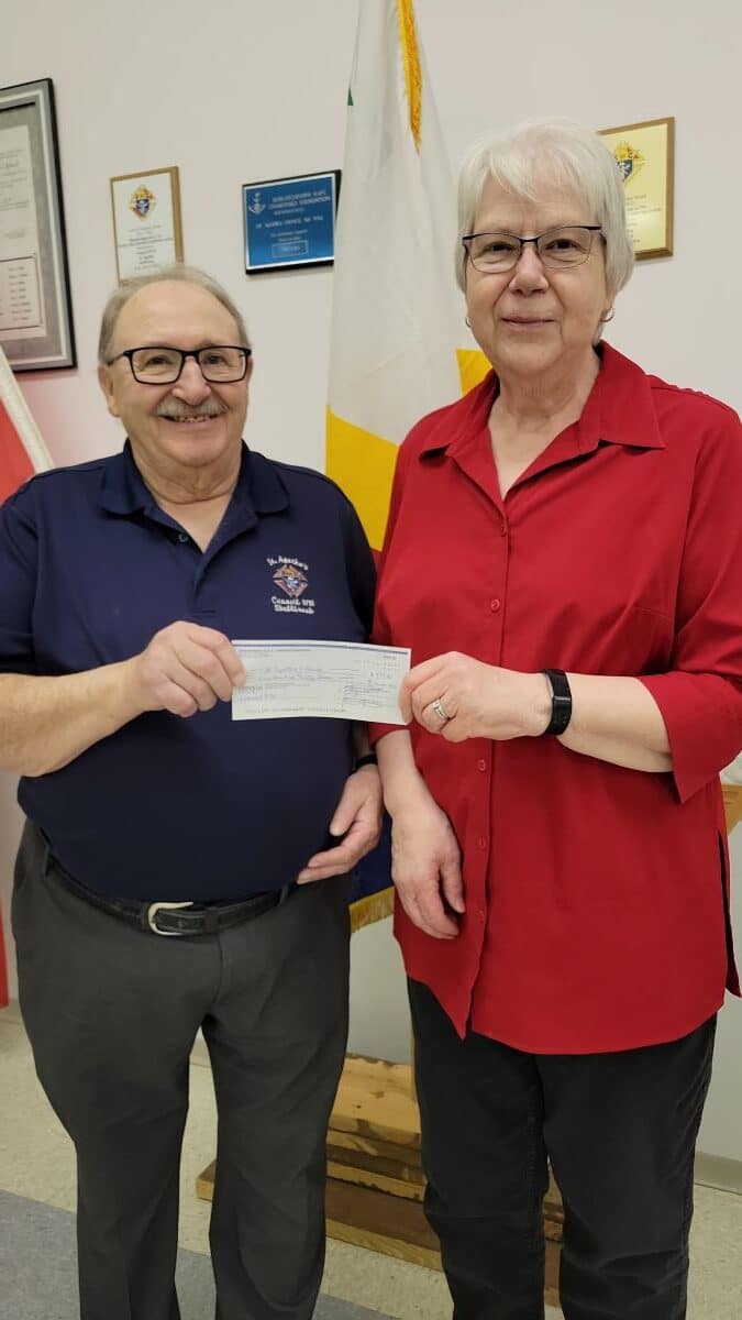 Council 9761 Shellbrook Presents Their Incentive Cheques 11 Calendars cheque, st Agatha's Parish by Al Dion to Faith Mazurek, Chair, Finance Committee.