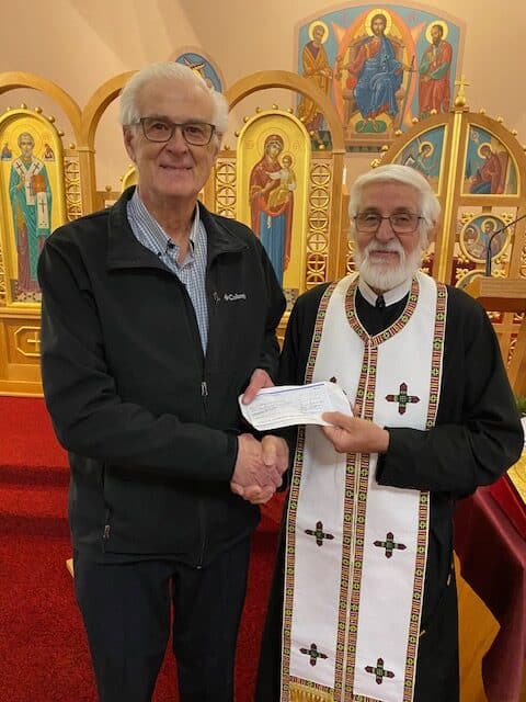 SS Peter & Paul Council 11775 in Saskatoon Presents Their Incentive Cheques 9 Father John Sianchuk, coordinator for Catholic Mission, to support an orphanage in Ukraine.