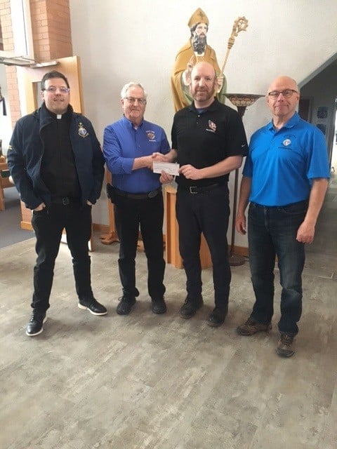 Humboldt Council 1886 in Humboldt Presents Another Incentive Cheque 1 Pictured is Fr Colin Roy, GK Vince Leonard. Dennis Corcoran, representing the camp and Brad Lefebvre
