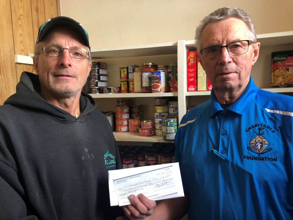 Luseland Council 6684 Presents Their Incentive Cheque to the Kerrobert Food Bank 1 Calvin Ressler, Past Grand Knight and representative of the Kerrobert Food Bank received the check from Marvin DeSchryver PSD and representative of the Sask. K of C Charitable Foundation
