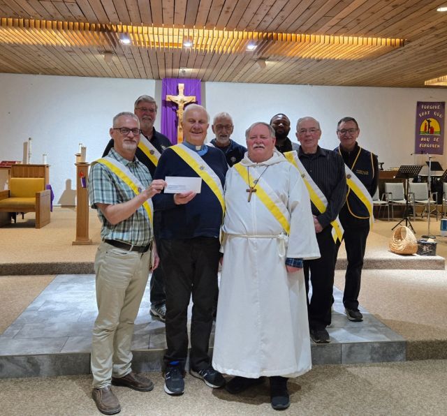 Father Gilpin Council #9760 in Moose Jaw Presents Their Incentive Cheque 1 Front row (L-R)GK Lawrence Wionzek, Father Nestor Gregoire, Les Good Backrow (L-R) Al Thiessen, Gilles Doiron, Emmanuel Okafor, Don Shanner, Gerard Sloan-Gauthier