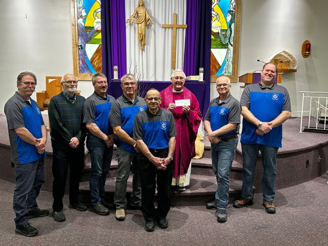 St. Michael Council #9949 in Prince Albert Presents Their Incentive Cheque 1 Names L to R: Claude St. Germaine, John Kreiser, Luc Robin, Dave Schultz, Phil Ruel, Msgr. Maurice Fiolleau, Darryl Sande, Don Bissky