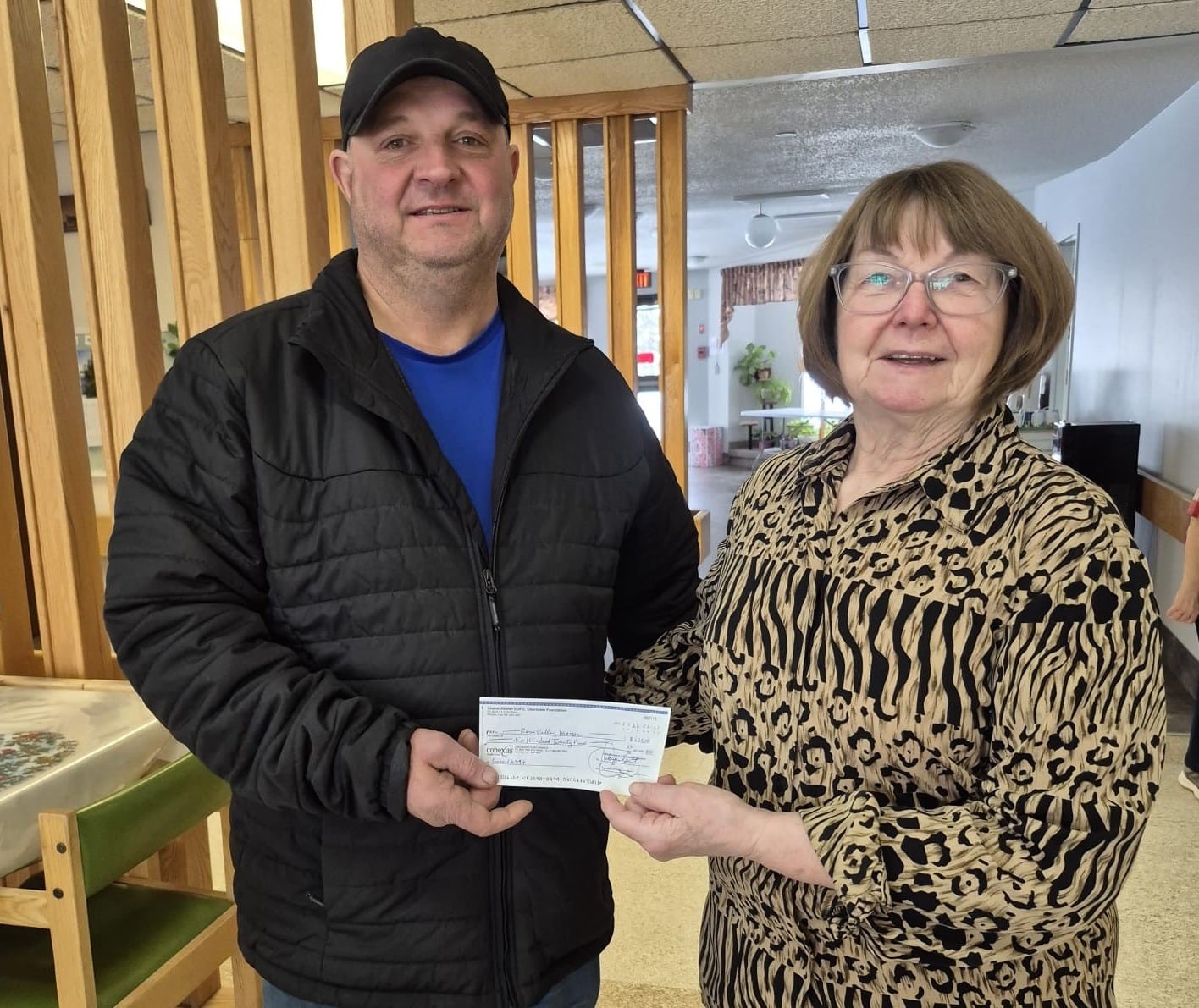 Father Kunka Council 6594 Presents Their Incentive Cheques 3 Rose Valley Manor, cheque presented by GK Mathew Fedirko to Lorna Hamilton
