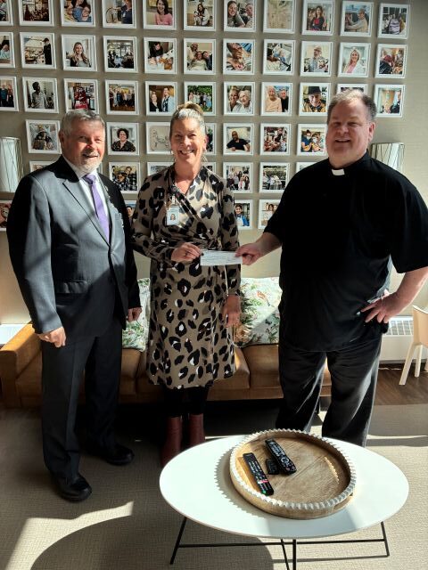 Denis Mahoney Council #8125 in Saskatoon Presents Their Incentive Cheque 1 Grand Knight Wayne Koshman, Lori Bjorkman, Director of Glengarda Hospice, and Fr. Gerard Cooper