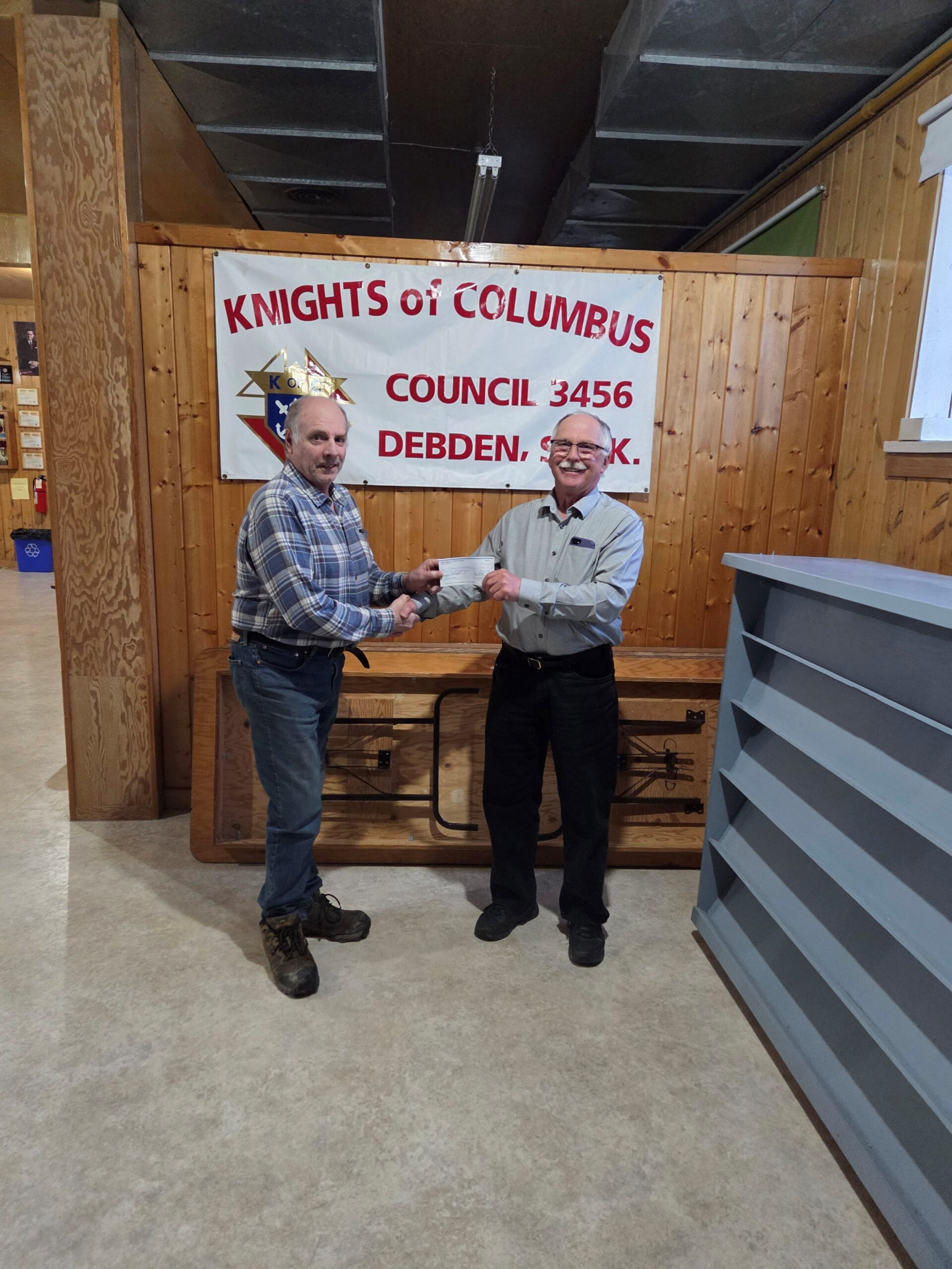 Debden Council #3456 Presents Their Incentive Cheques 1 FS Claude Ruel (left) with Tony Lukan (on behalf of Big River Parish)