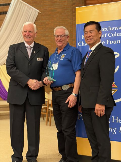 Humboldt Council 1886 Grand Knight - Vincent Leonard, with Sask K of C Charitable Foundation President Harvey Granatier, and Supreme Representative Toni Pascua