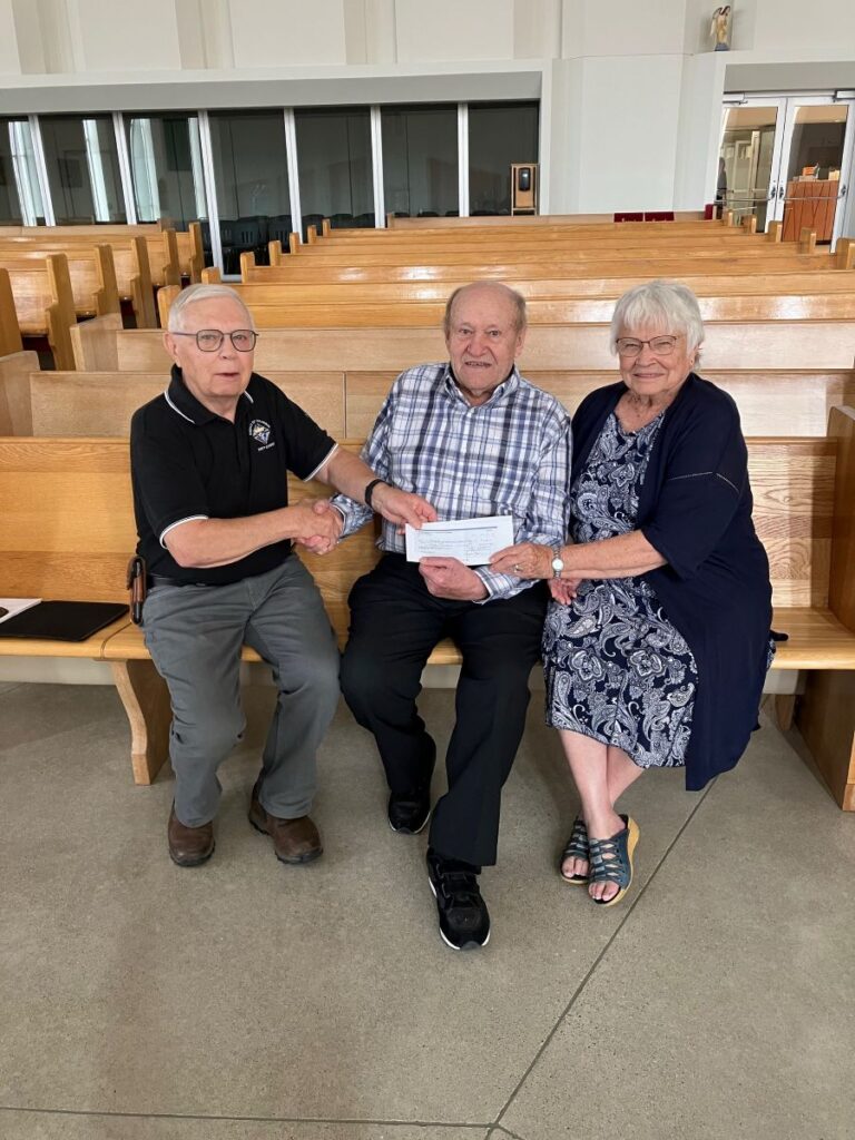 Introducing the Alma & James Meier Youth Endowment 1 Grand Knight Gord Hagan from Swift Current Council 3031 with James & Alma Meier