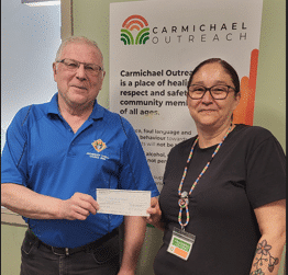 Sask K of C Charitable Foundation donates to Various Charities suggested by Archbishop O'Neill Council #8896 1 GK Eugene Achtemichuk presents a $1,000 ck to Tiffany Hill