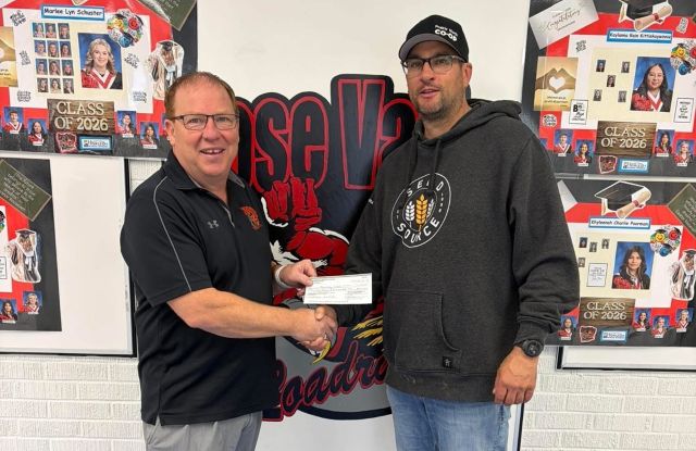 Bro Steven Gutek, Life Director, presented to Principal at Rose Valley School
